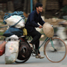 Cyclist in Hanoi (you would be amazed just what they can carry!) - Vietnam.